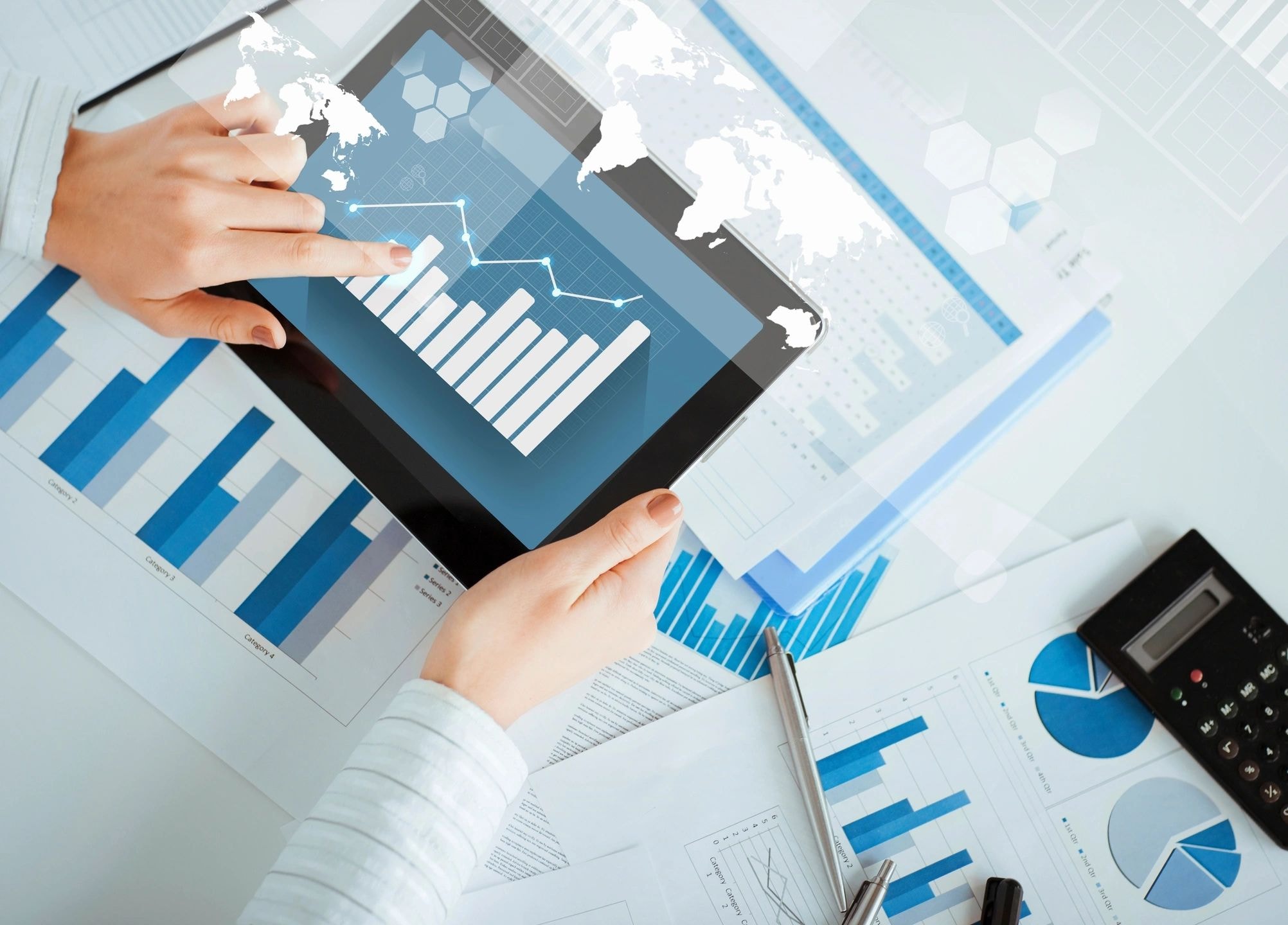 Financial reports and charts on a desk
